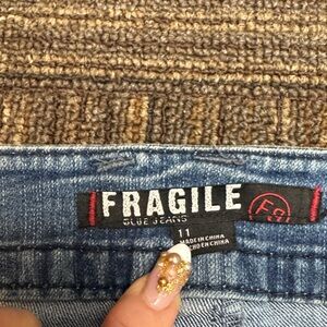 Fragile Women's Straight Leg Jeans — Light Blue Wash